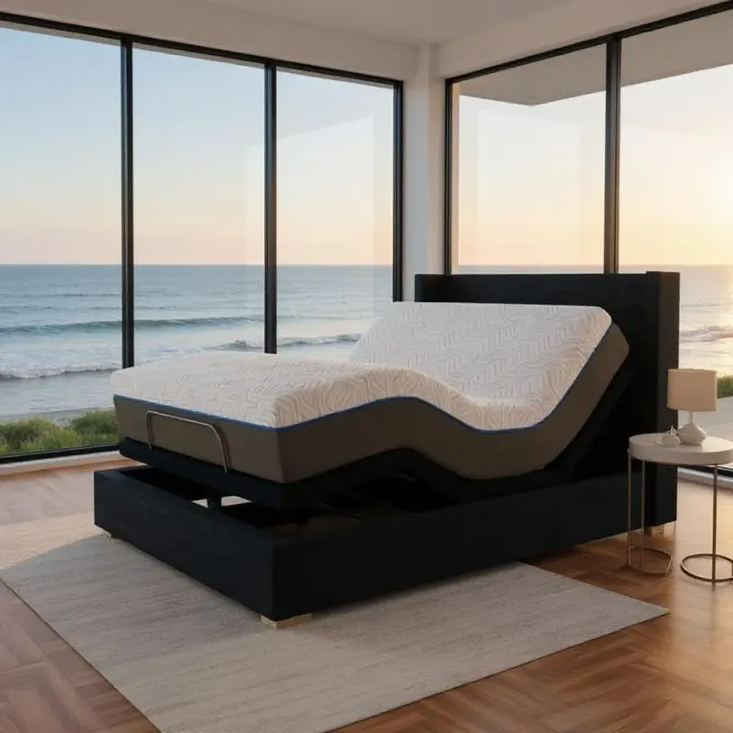 A modern beige upholstered bed frame featuring a tall, vertical channel-tufted headboard. The bed is dressed in crisp white linens and a plush duvet, set in a bright, minimalist bedroom with light wood floors.